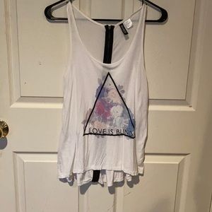 White tank top with black zipper down the back